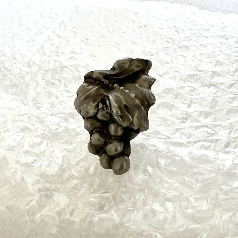 Grape cluster cabinet knob.
